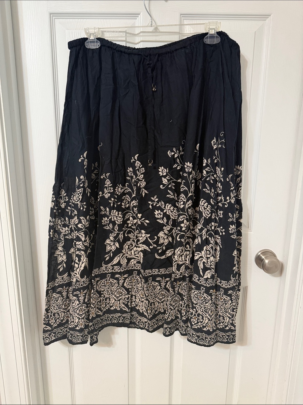 Avenue Black Maxi Skirt with White Floral Border